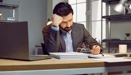 Accountancy office worker looking tired and pale