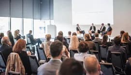 Round table discussion at business convention and presentation