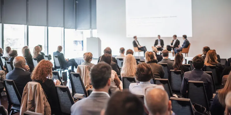 Round table discussion at business convention and presentation