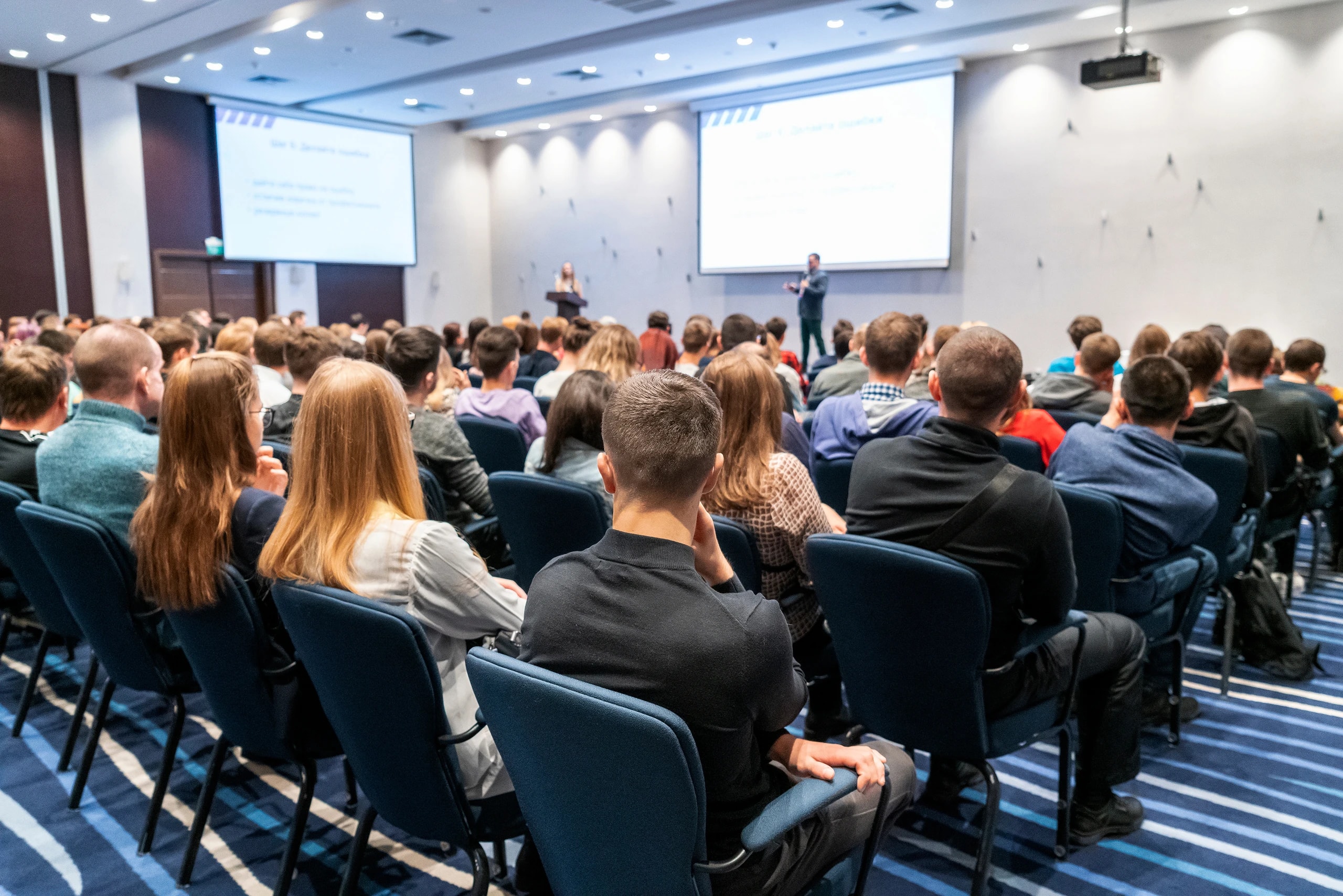 Conference taking place in a large conference room