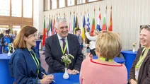 Visitors engaging in conversations with Eurofound staff and director during the Eurofound Open Day 2026