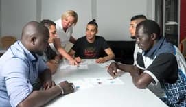 Language training for refugees in a German camp