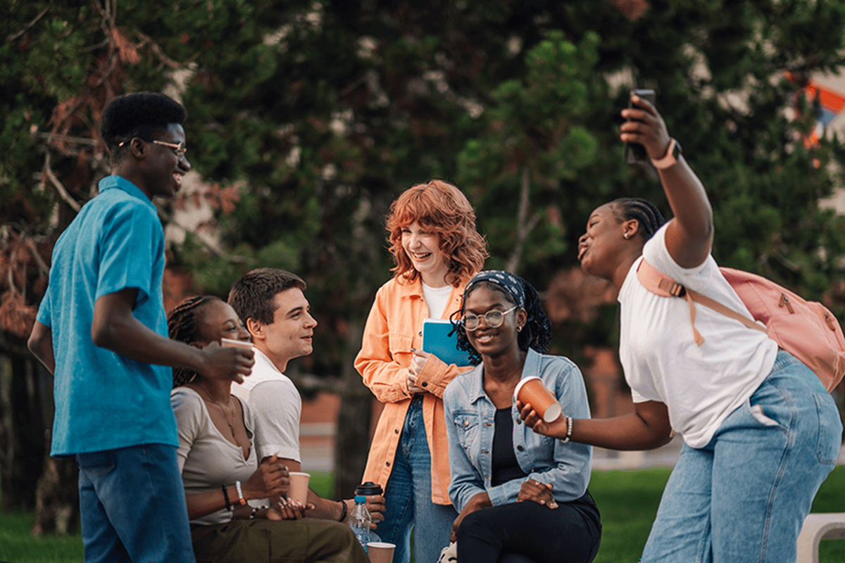 group of young adults in a park