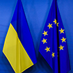 Image of Ukrainian flag on the left and EU flag on the right.